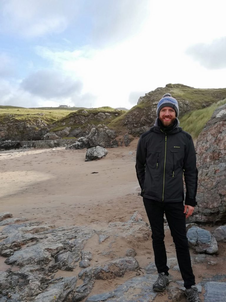 Kenneth Gould on a rocky Scottish beach